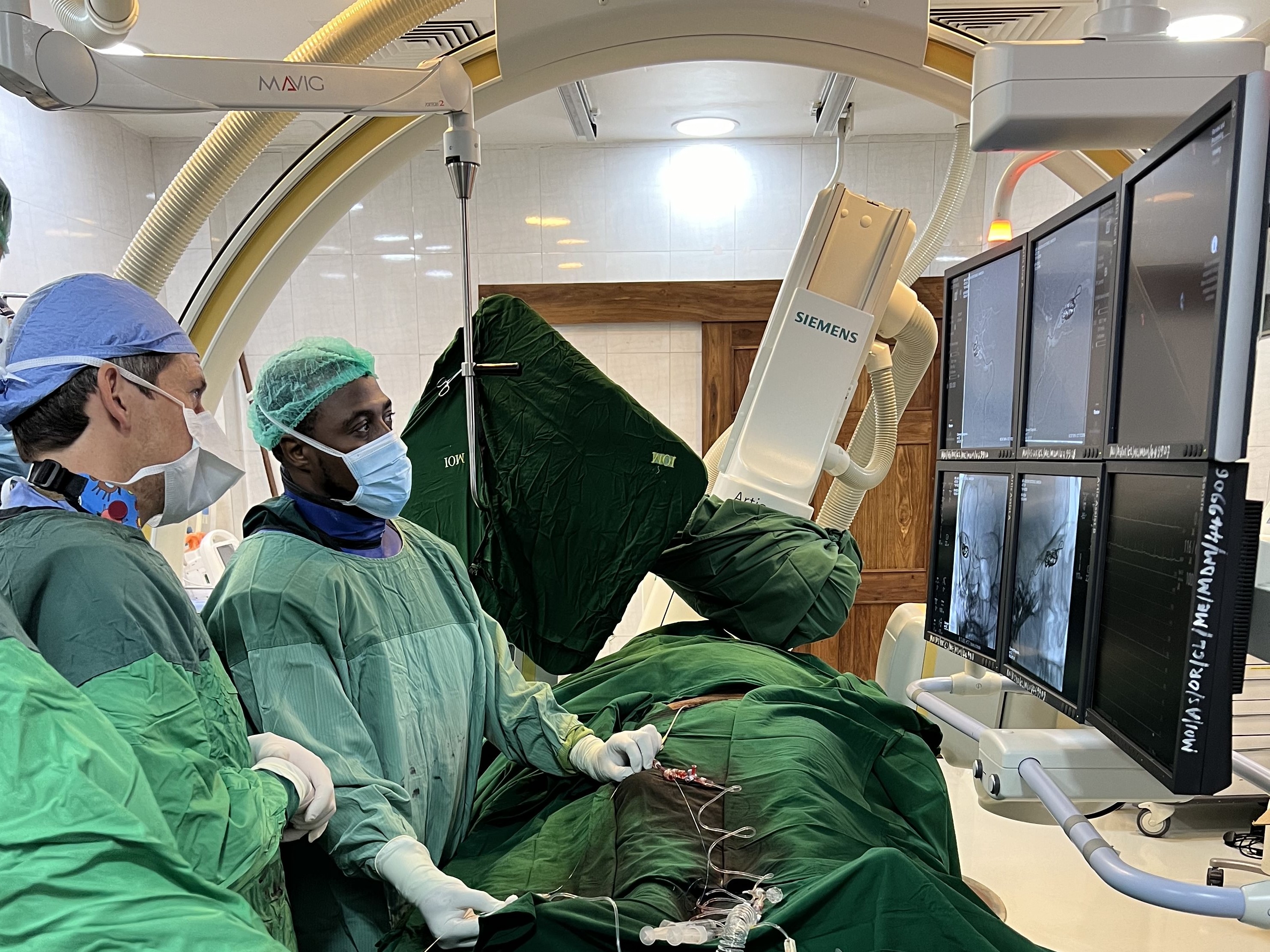 Dr. Budohoski training other doctors on stroke care in Tanzania
